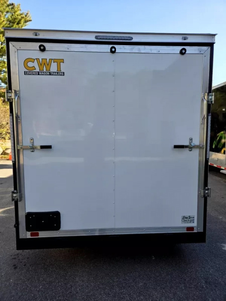 New 2026 7X17 CARGO TRAILER WITH E TRAC EXTRA HEGHT - Covered Wagon