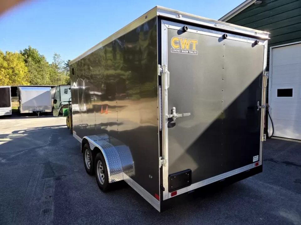 New 2026 7x16 extra height cargo trailer with e trac and rear ramp - Covered Wagon