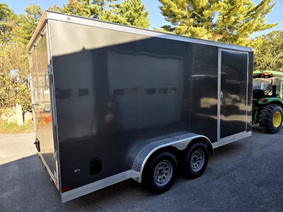 New 2026 7x16 extra height cargo trailer with e trac and rear ramp - Covered Wagon