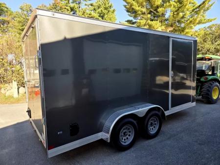 New 2026 7x16 extra height cargo trailer with e trac and rear ramp - Covered Wagon