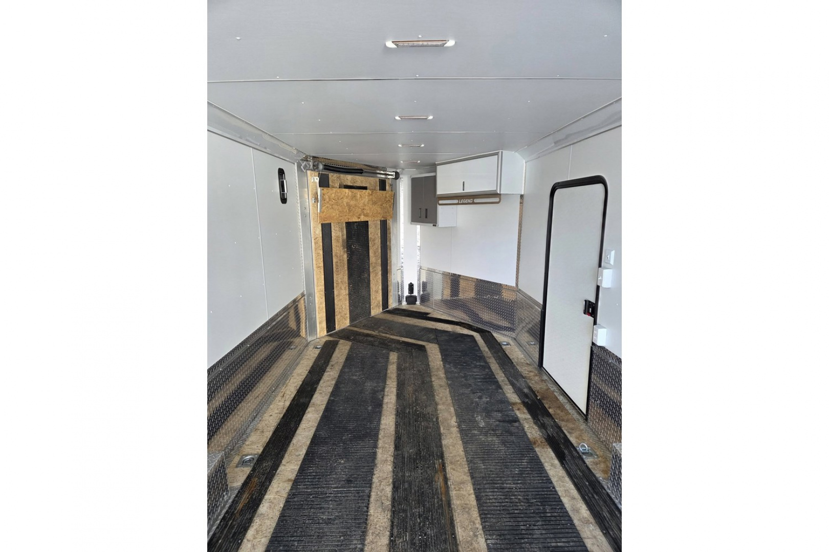 Used 2024 8.5x26 TMV loaded with upgrades 9990lb gvwr 4 place snowmobile atv sxs utv or car hauler trailer - Legend Premium Trailers