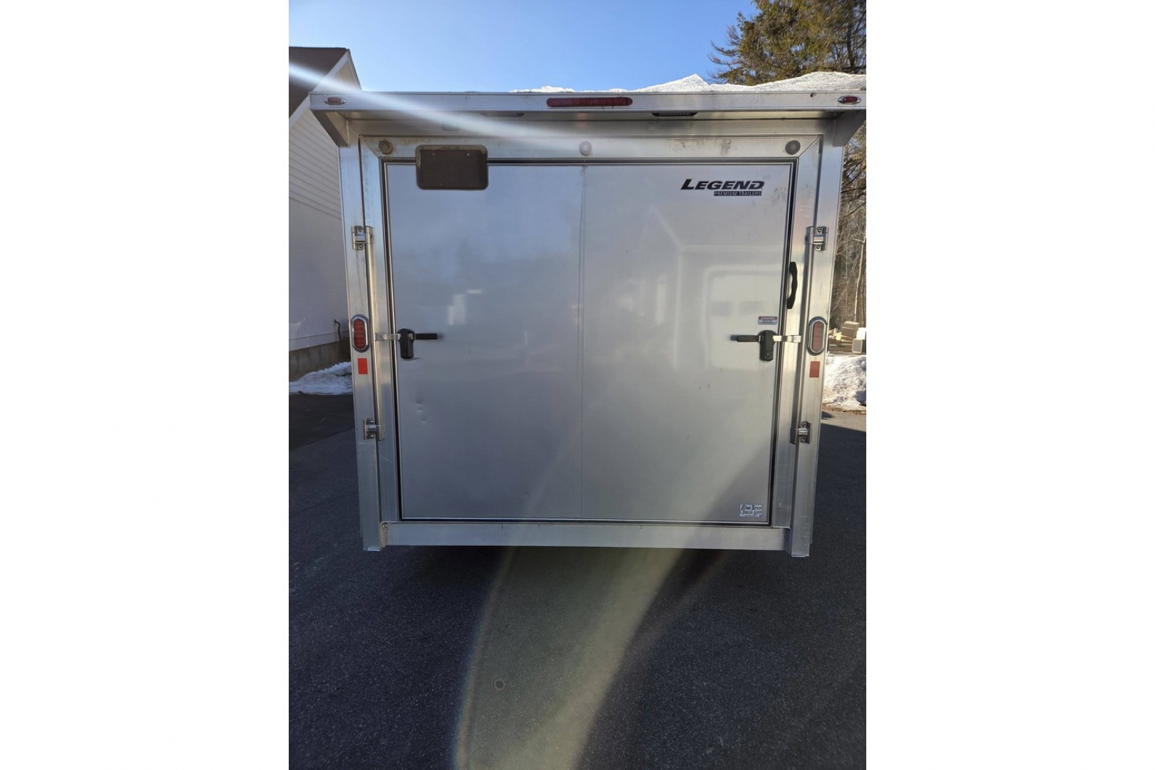 Used 2024 8.5x26 TMV loaded with upgrades 9990lb gvwr 4 place snowmobile atv sxs utv or car hauler trailer - Legend Premium Trailers