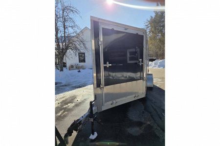 New 2018 7x14 2 place snowmobile atv motorcycle lawn mower trailer with front ramp & finished interior pre-ow - Legend Premium Trailers