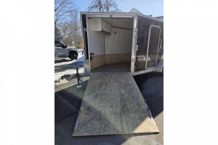 New 2018 7x14 2 place snowmobile atv motorcycle lawn mower trailer with front ramp & finished interior pre-ow - Legend Premium Trailers