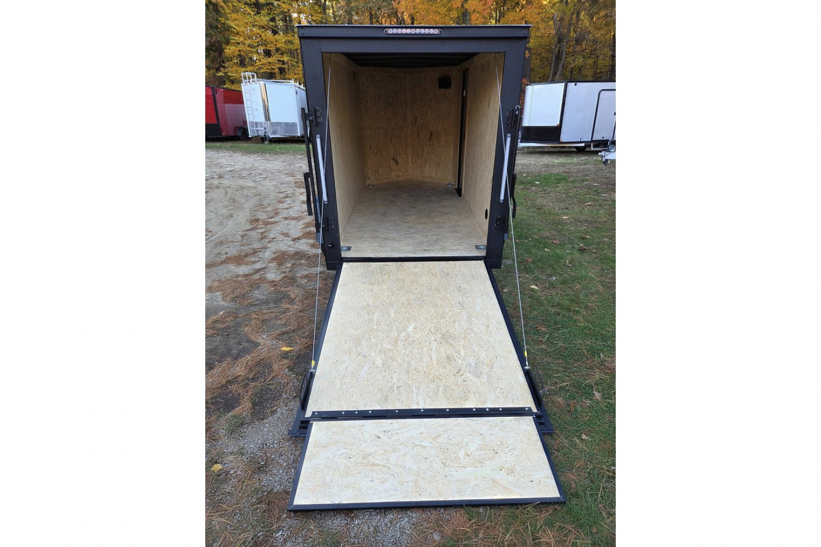 New 2026 5x10 enclosed cargo trailer with black out package - Covered Wagon