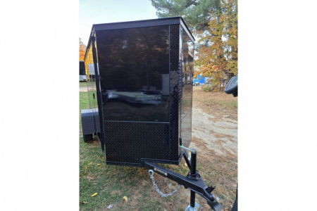 New 2026 5x10 enclosed cargo trailer with black out package - Covered Wagon