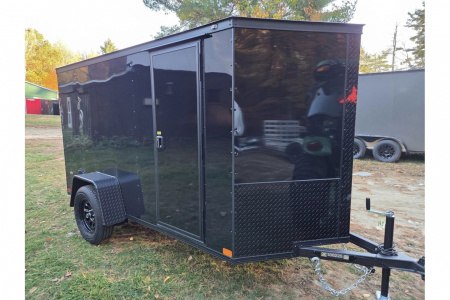 New 2026 5x10 enclosed cargo trailer with black out package - Covered Wagon