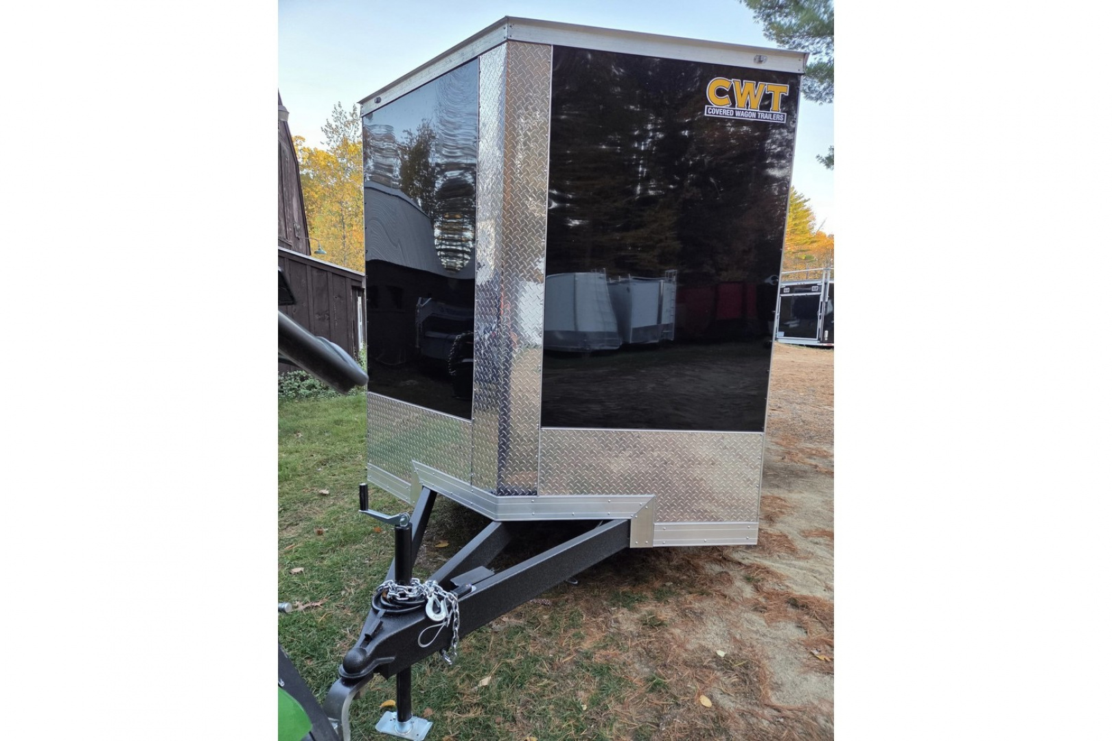 New 2026 8.5x16 extra height enclosed cargo trailer with wall e trac and poly core siding rear ramp door - Covered Wagon
