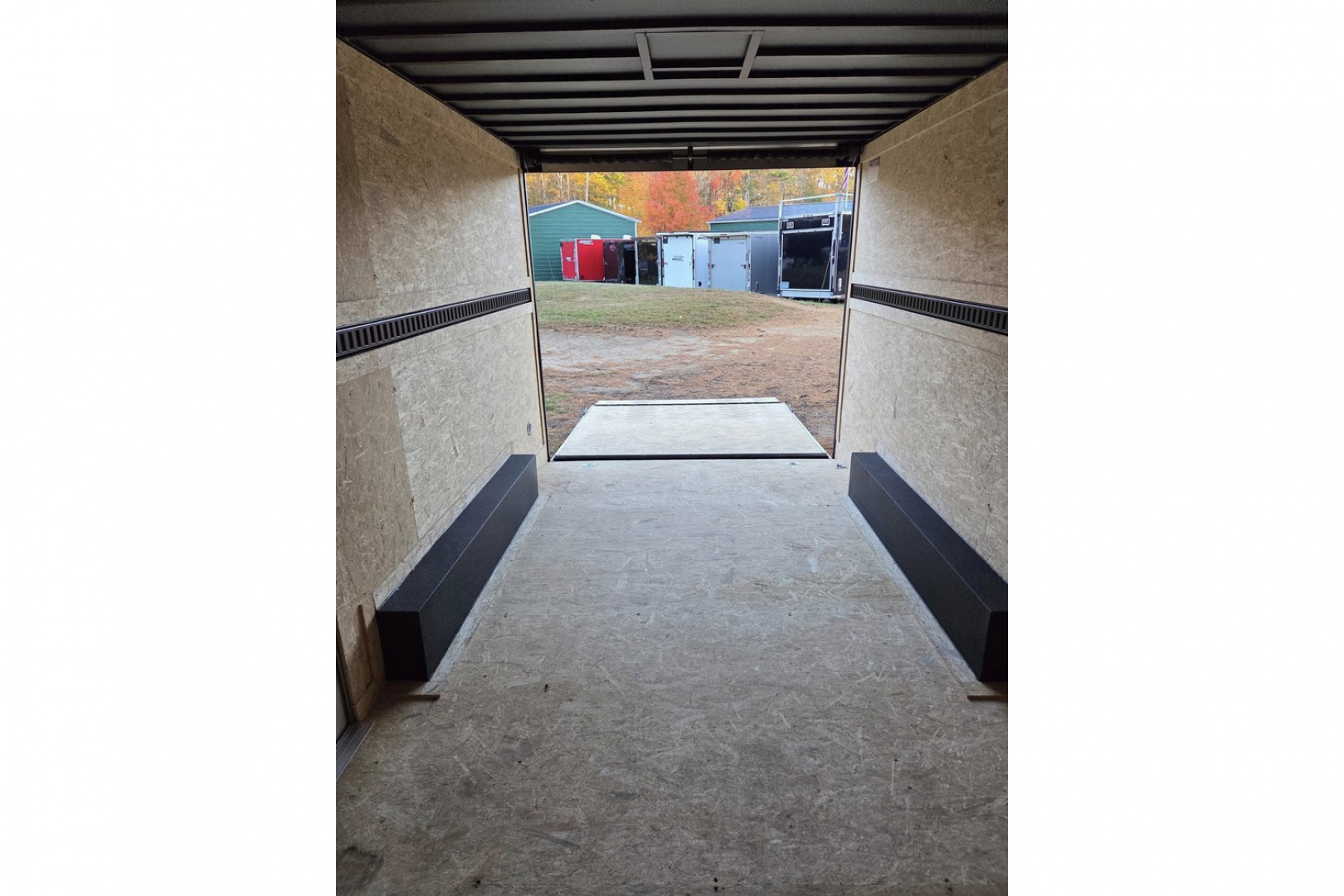 New 2026 8.5x16 extra height enclosed cargo trailer with wall e trac and poly core siding rear ramp door - Covered Wagon