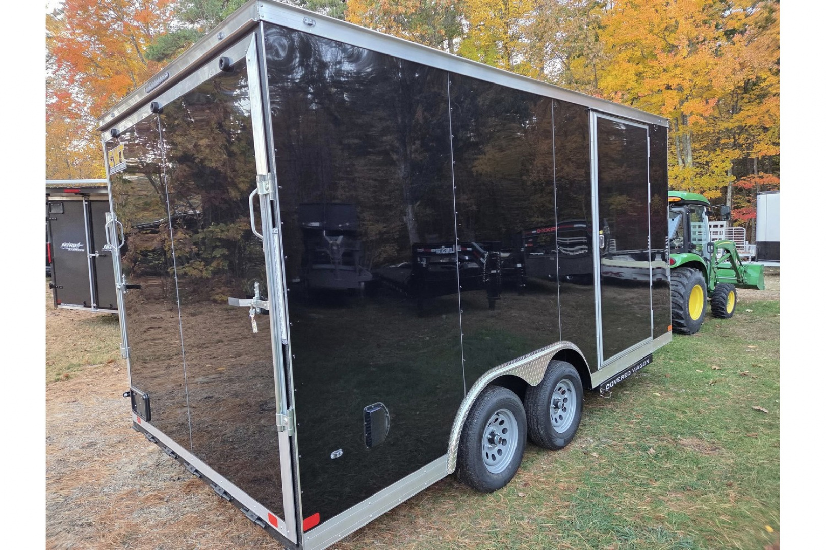 New 2026 8.5x16 extra height enclosed cargo trailer with wall e trac and poly core siding rear ramp door - Covered Wagon