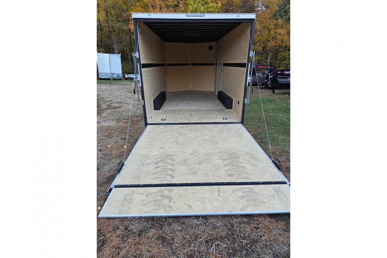 New 2026 8.5x16 extra height enclosed cargo trailer with wall e trac and poly core siding rear ramp door - Covered Wagon
