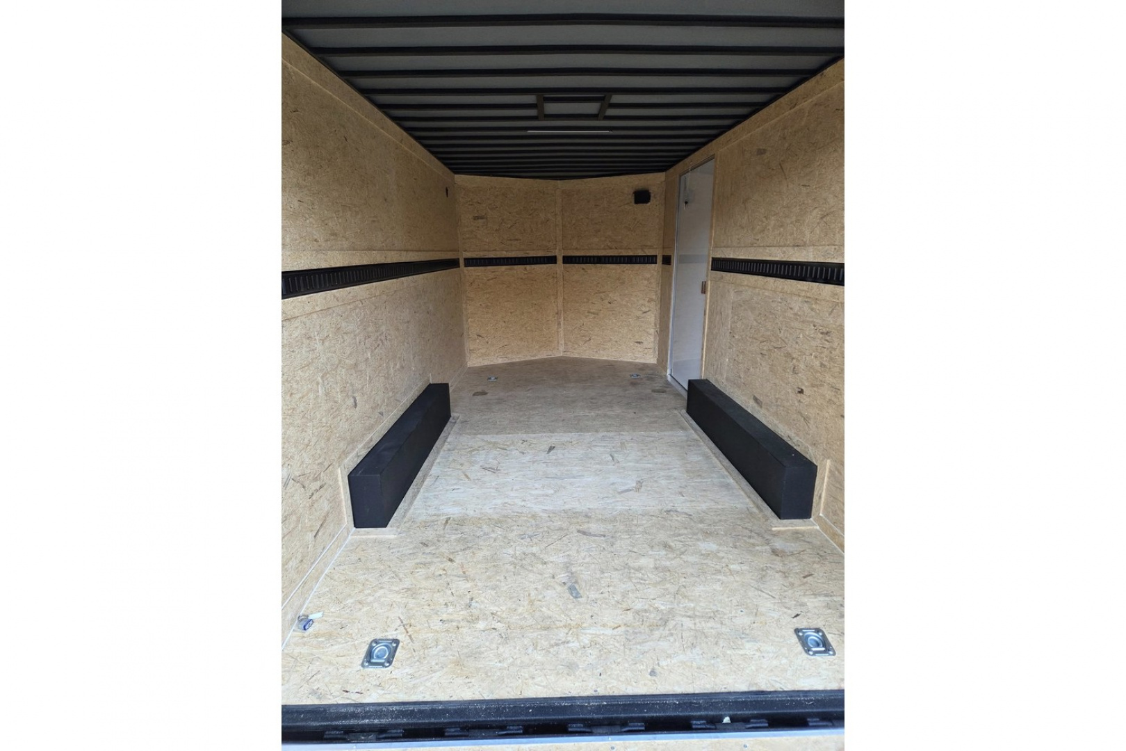 New 2026 8.5x16 extra height enclosed cargo trailer with wall e trac and poly core siding rear ramp door - Covered Wagon