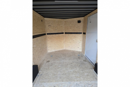 New 2026 8.5x16 extra height enclosed cargo trailer with wall e trac and poly core siding rear ramp door - Covered Wagon