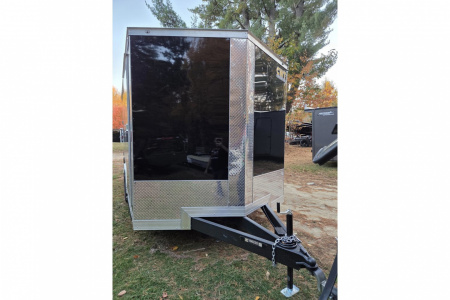 New 2026 8.5x16 extra height enclosed cargo trailer with wall e trac and poly core siding rear ramp door - Covered Wagon