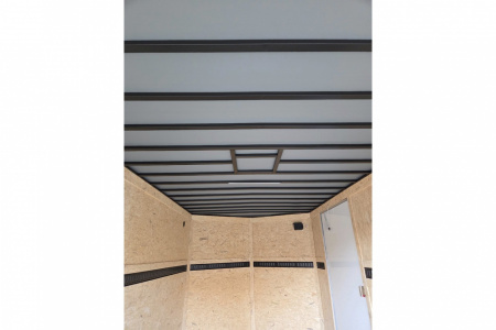 New 2026 8.5x16 extra height enclosed cargo trailer with wall e trac and poly core siding rear ramp door - Covered Wagon