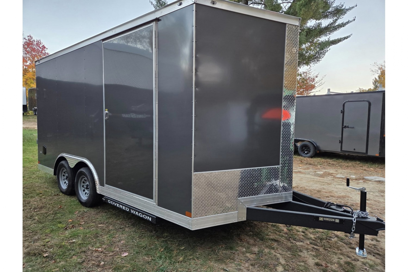 New 2026 8.5x16 extra height enclosed cargo trailer with wall e trac and poly core siding rear ramp door - Covered Wagon