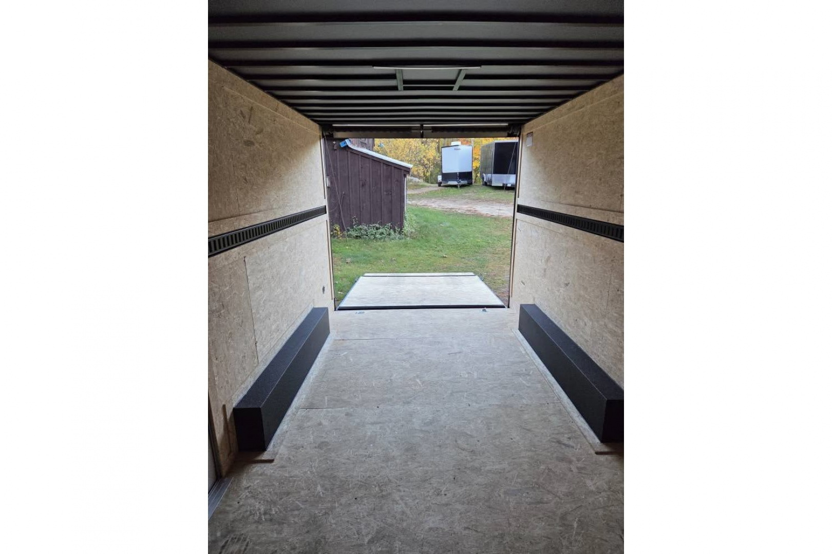 New 2026 8.5x16 extra height enclosed cargo trailer with wall e trac and poly core siding rear ramp door - Covered Wagon