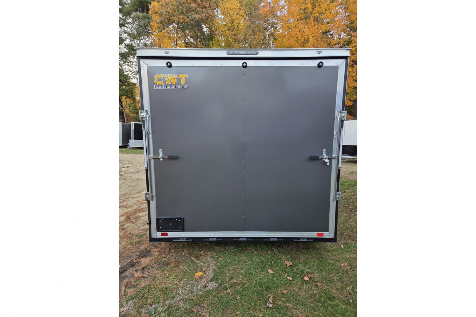 New 2026 8.5x16 extra height enclosed cargo trailer with wall e trac and poly core siding rear ramp door - Covered Wagon