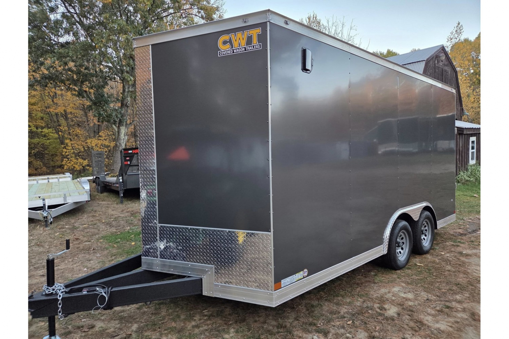 New 2026 8.5x16 extra height enclosed cargo trailer with wall e trac and poly core siding rear ramp door - Covered Wagon