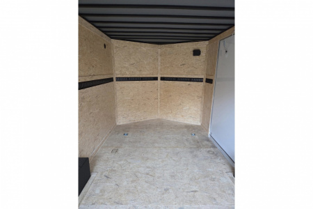 New 2026 8.5x16 extra height enclosed cargo trailer with wall e trac and poly core siding rear ramp door - Covered Wagon