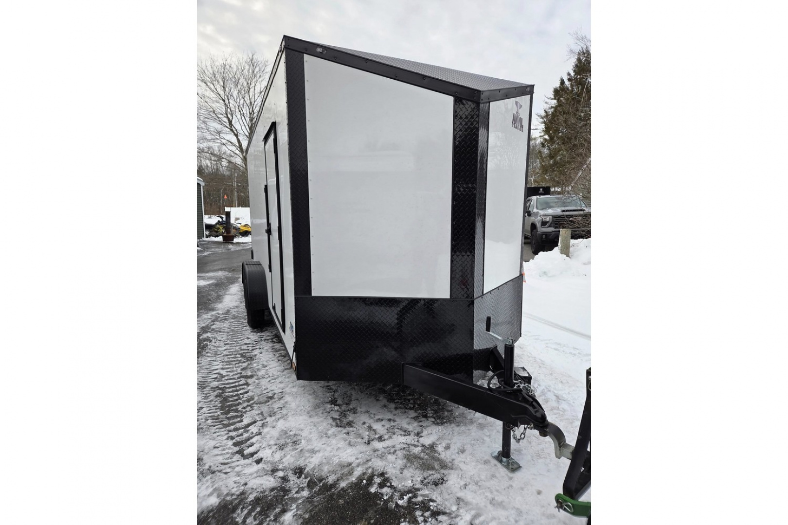 New 2026 7X16 extra height enclosed cargo trailer with black out trim package rear ramp door - Anvil Trailers