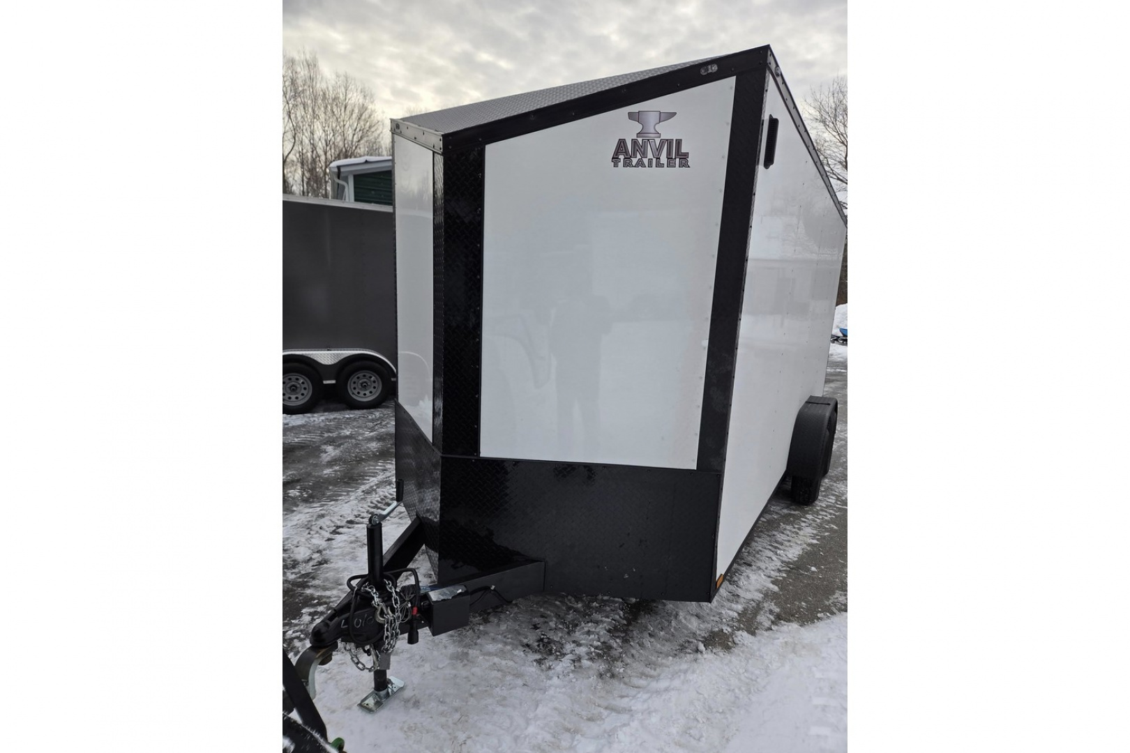 New 2026 7X16 extra height enclosed cargo trailer with black out trim package rear ramp door - Anvil Trailers