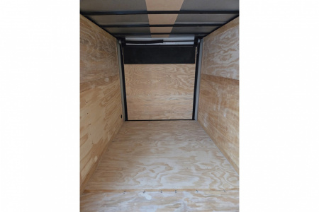 New 2026 7X16 extra height enclosed cargo trailer with black out trim package rear ramp door - Anvil Trailers