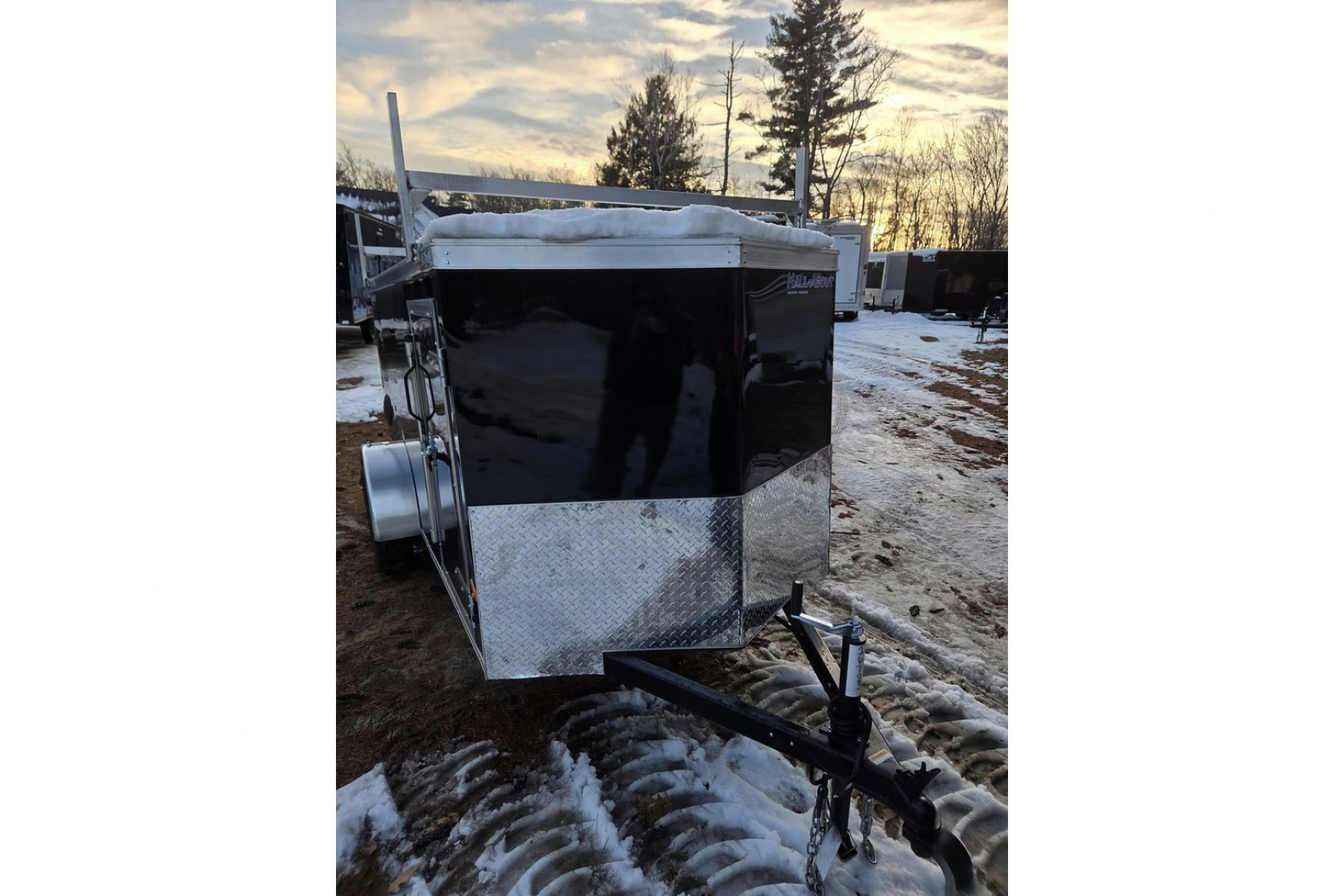 New 2026 5x10 enclosed cargo trailer with barn doors and ladder racks - Haul-About