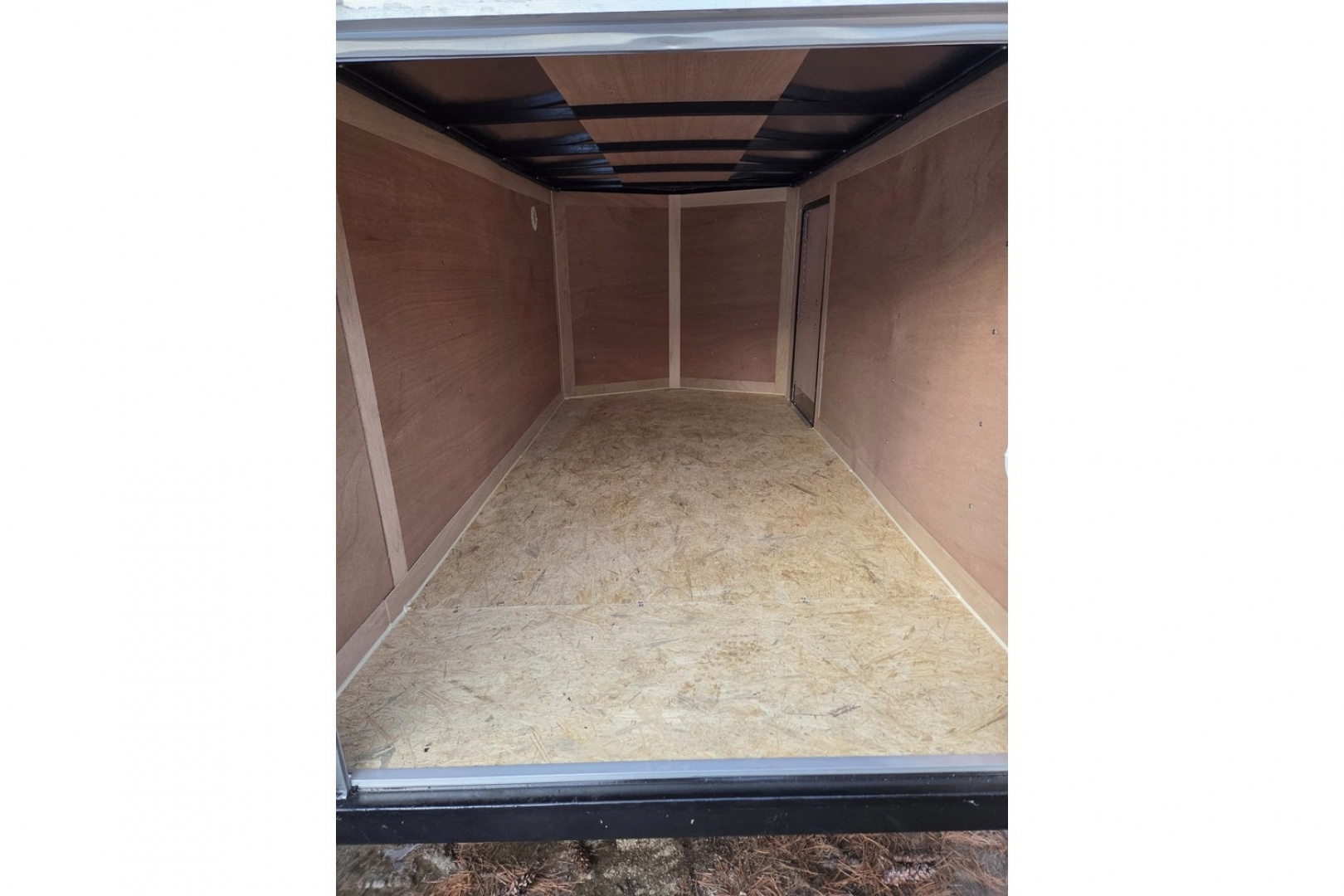 New 2026 5x10 enclosed cargo trailer with barn doors and ladder racks - Haul-About