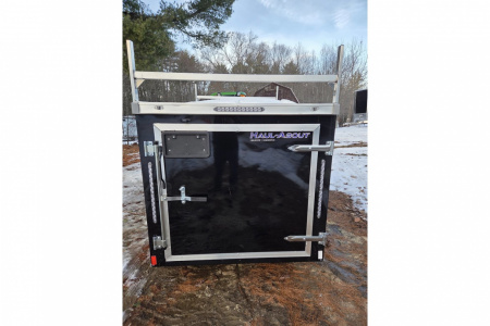 New 2026 5x10 enclosed cargo trailer with barn doors and ladder racks - Haul-About