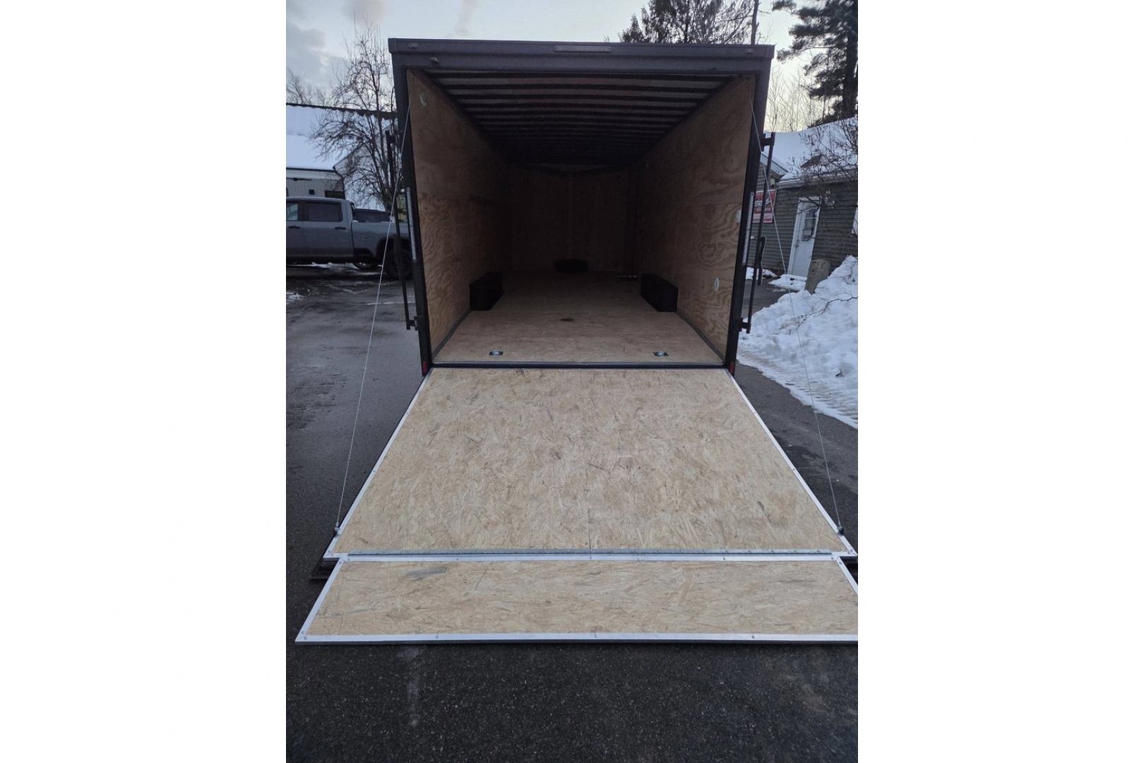 New 2026 8.5X24 9990LB GVWR ENCLOSED CAR HAULER EXTRA HEIGHT WHITE WITH BLAKC OUT TRIM PACKAGE - Haul-About