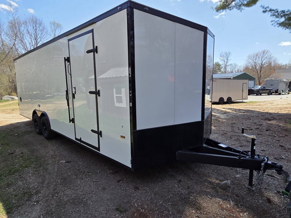 New 2026 8.5X24 9990LB GVWR ENCLOSED CAR HAULER EXTRA HEIGHT WHITE WITH BLAKC OUT TRIM PACKAGE - Haul-About