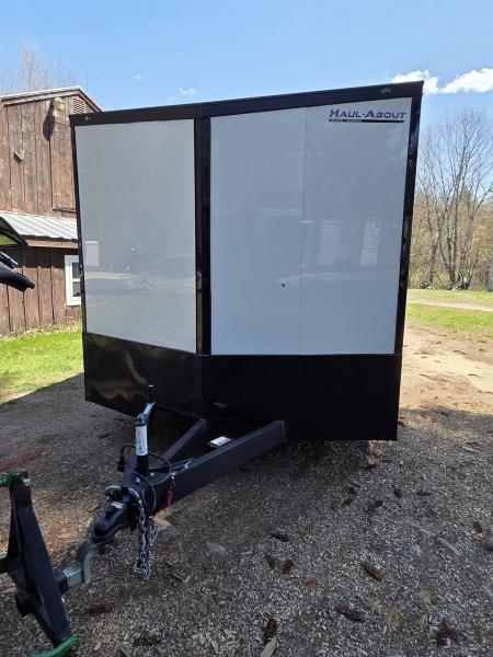 New 2026 8.5X24 9990LB GVWR ENCLOSED CAR HAULER EXTRA HEIGHT WHITE WITH BLAKC OUT TRIM PACKAGE - Haul-About