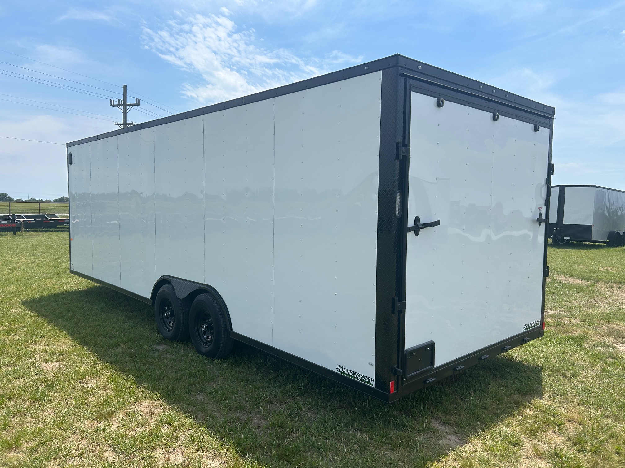 New 2026 Rock Solid 83x24 Tandem 10K Cargo w/ Ramp Door & 7' Interior Height