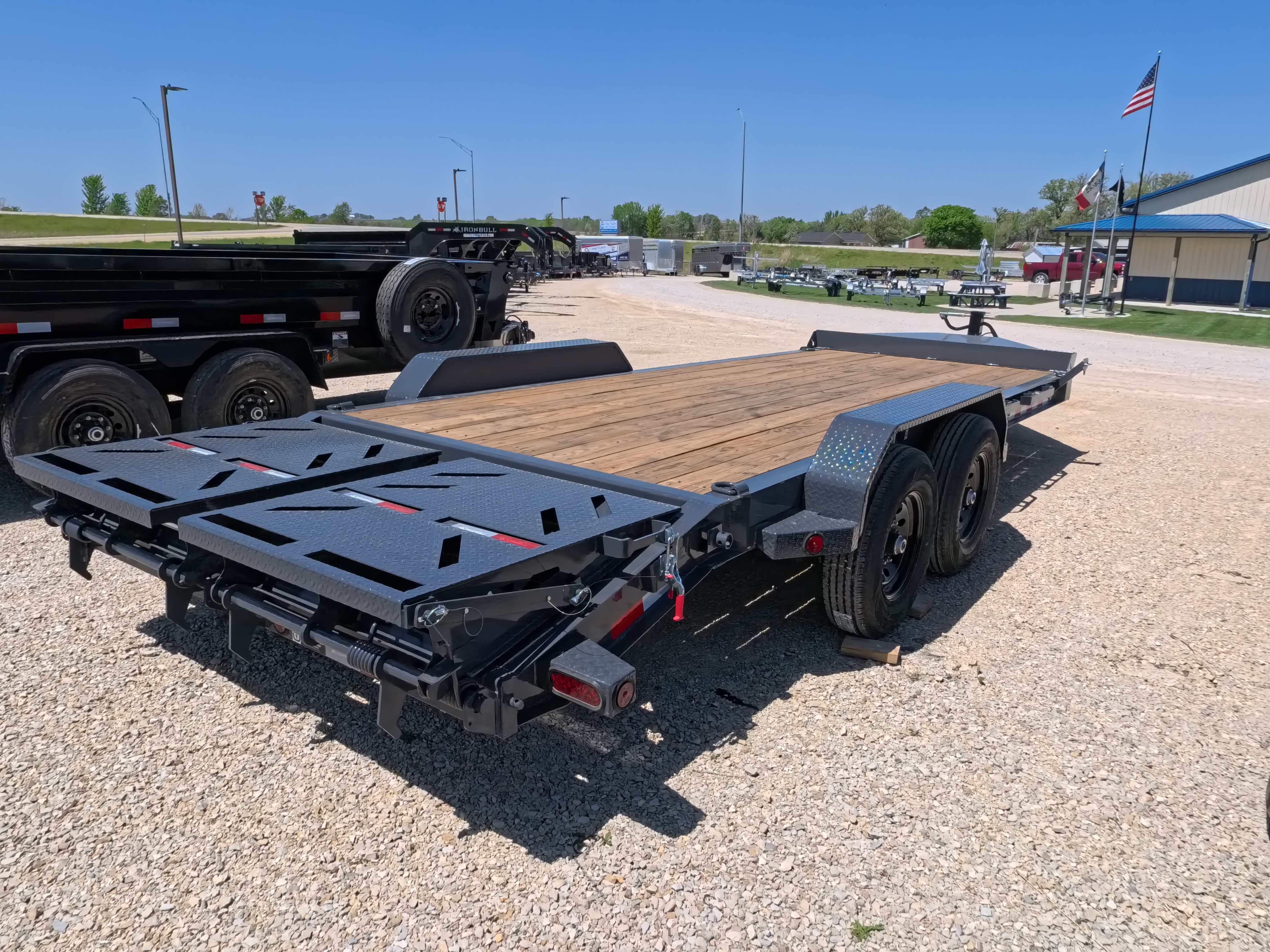 New 2026 Iron Bull 83x20 EWB Equipment Trailer, 14K GVWR, 3' Self Cleaning Dove Tail w/Rampage Ramps, Adj. 14K Coupler, LRE 10 Ply Tires