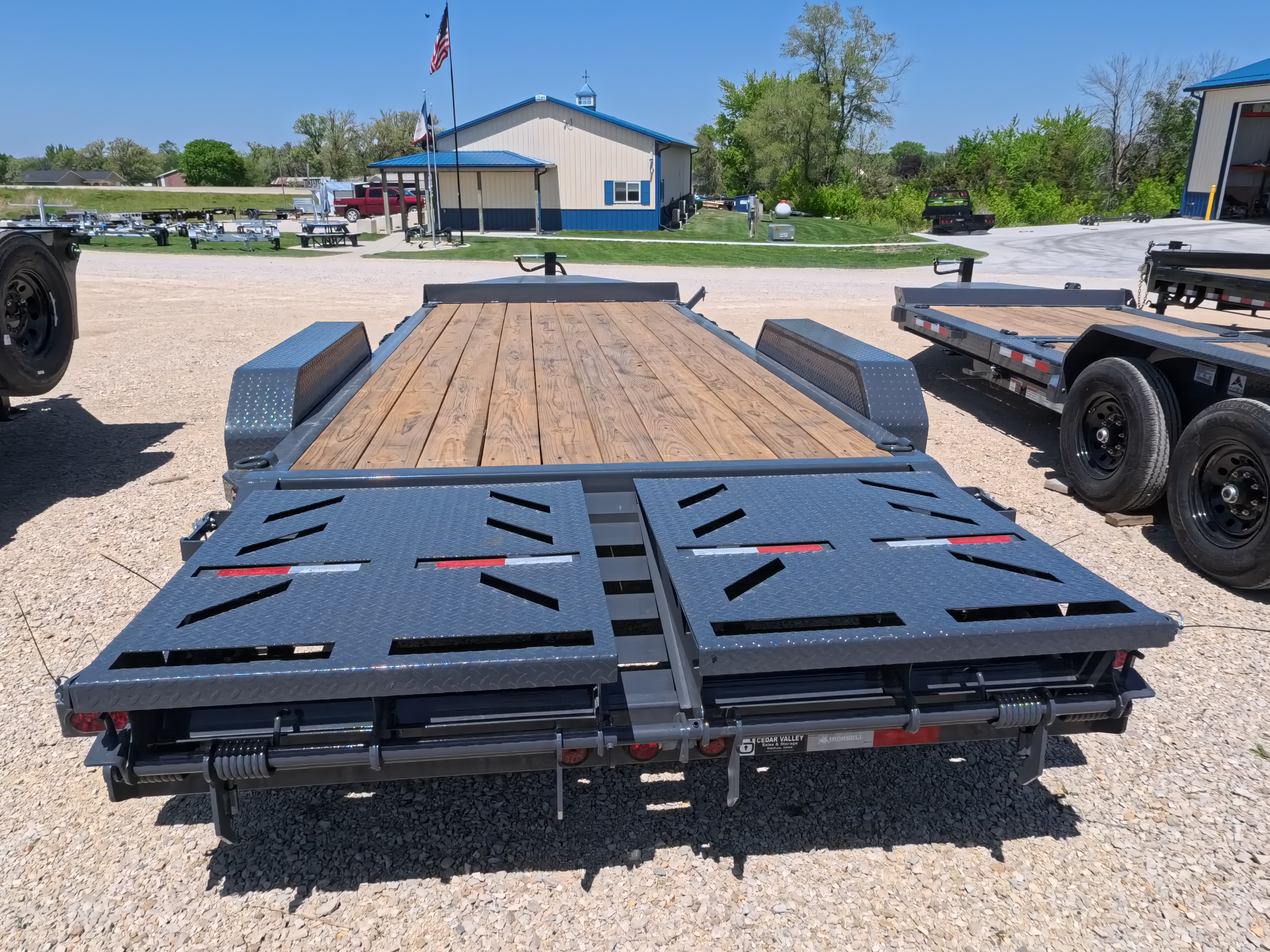 New 2026 Iron Bull 83x20 EWB Equipment Trailer, 14K GVWR, 3' Self Cleaning Dove Tail w/Rampage Ramps, Adj. 14K Coupler, LRE 10 Ply Tires