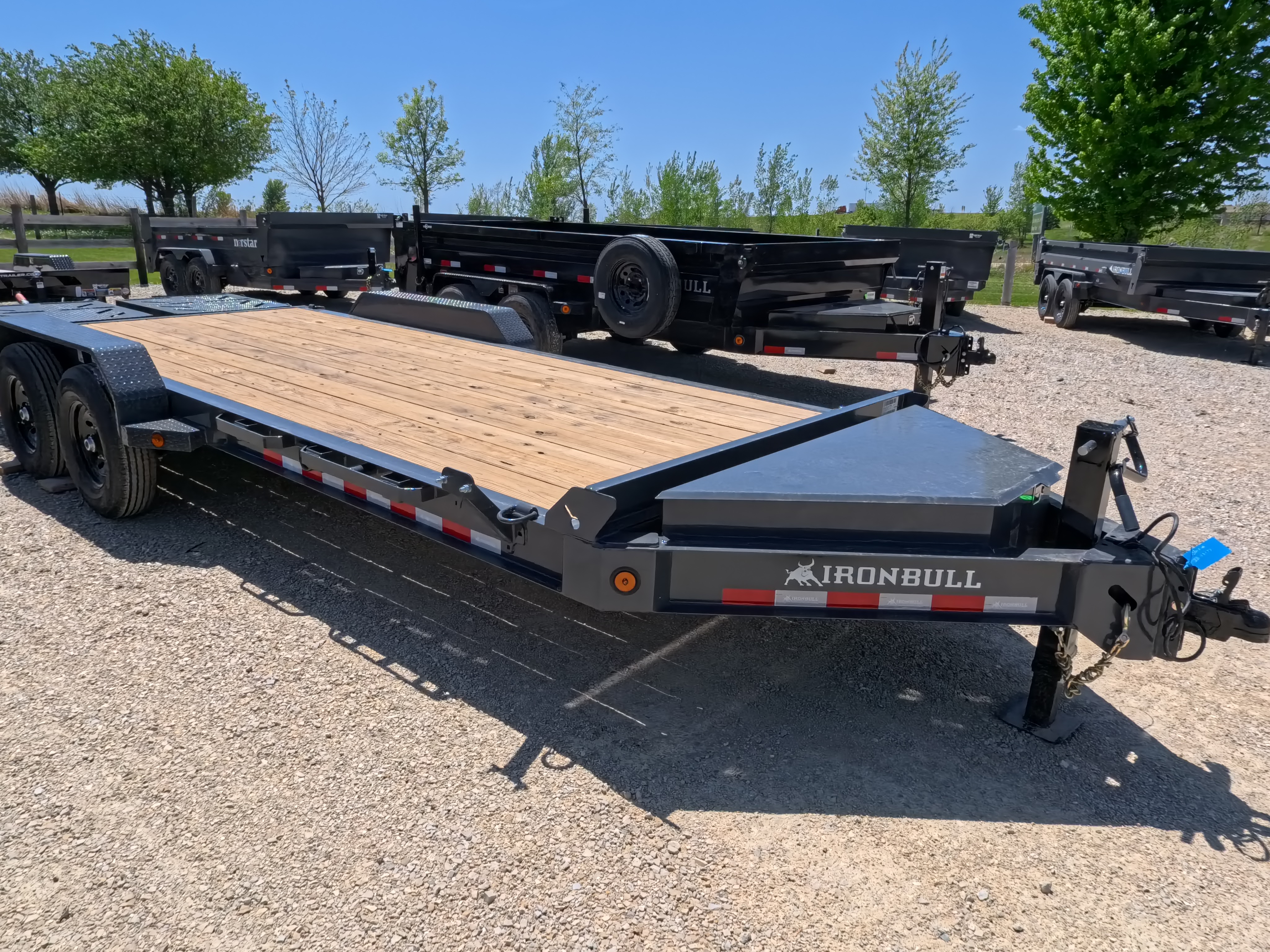 New 2026 Iron Bull 83x20 EWB Equipment Trailer, 14K GVWR, 3' Self Cleaning Dove Tail w/Rampage Ramps, Adj. 14K Coupler, LRE 10 Ply Tires