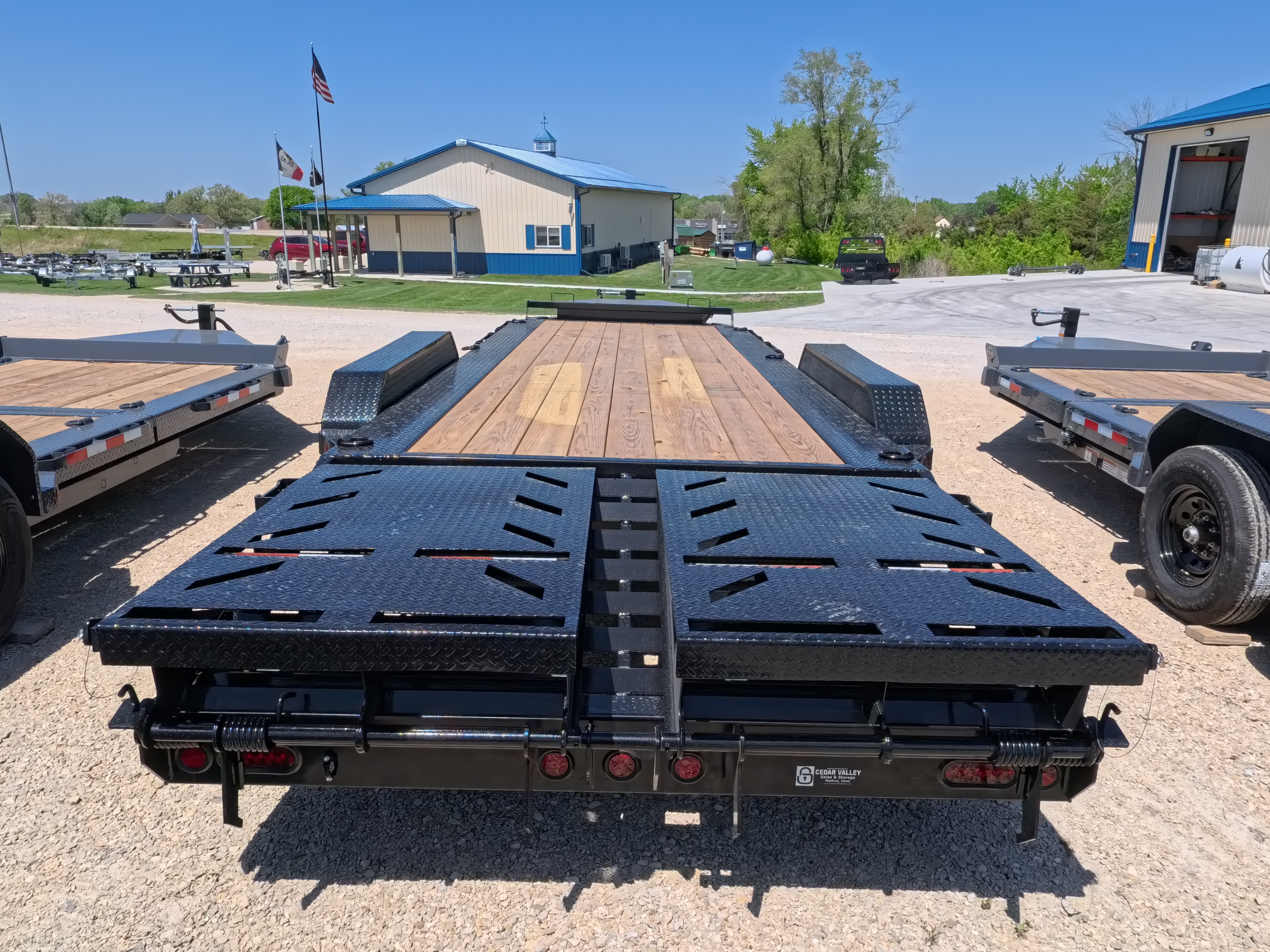 New 2026 Iron Bull 83 X 22 EHB Equipment Trailer w/2- 10K Axles, 4' Self Cleaning Dove Tail and 4' Rampage Ramps, Adj. 25K Coupler and 2 5/16" Receiver , LRJ 18 Ply Tires
