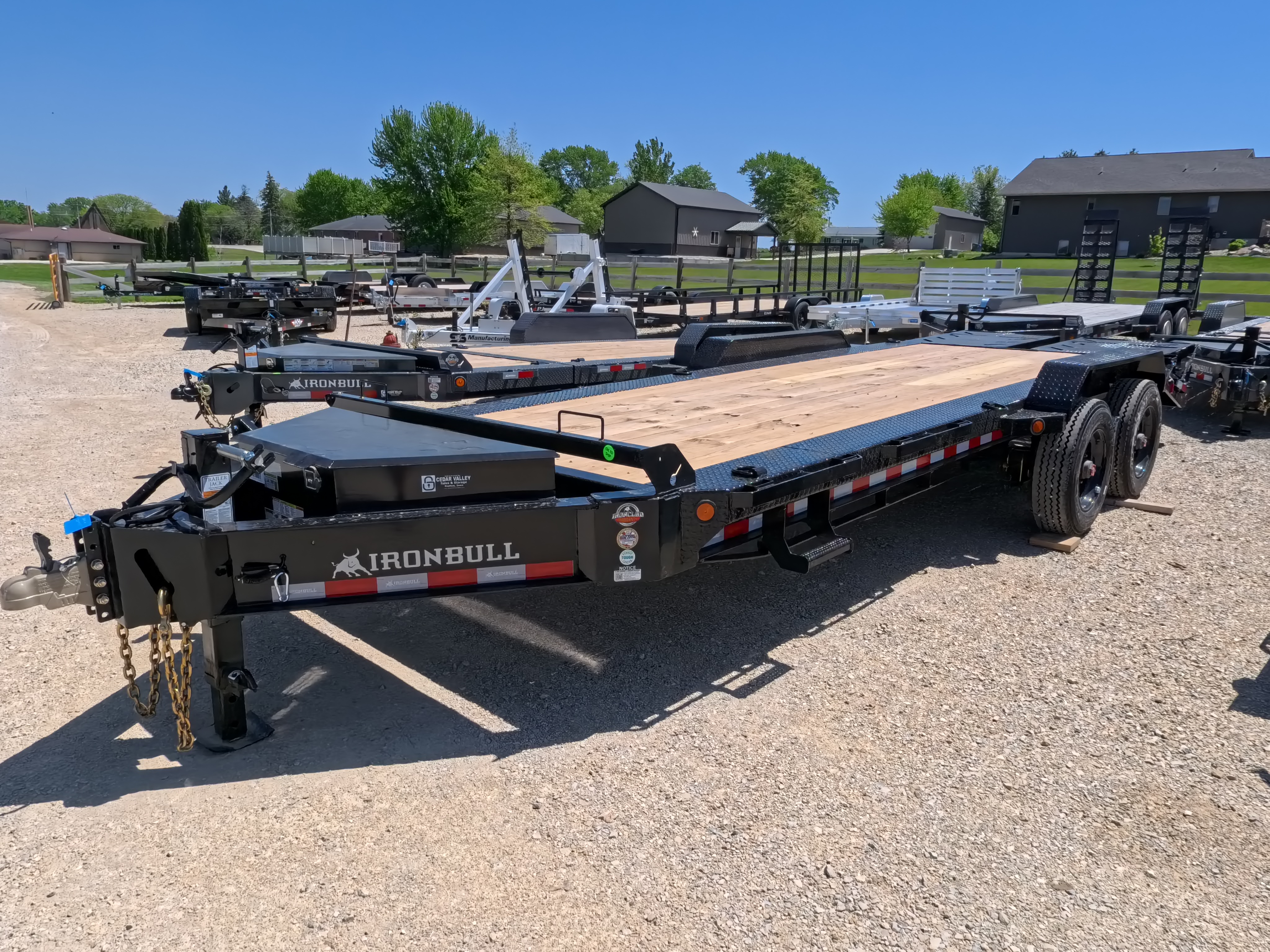 New 2026 Iron Bull 83 X 22 EHB Equipment Trailer w/2- 10K Axles, 4' Self Cleaning Dove Tail and 4' Rampage Ramps, Adj. 25K Coupler and 2 5/16  Receiver , LRJ 18 Ply Tires