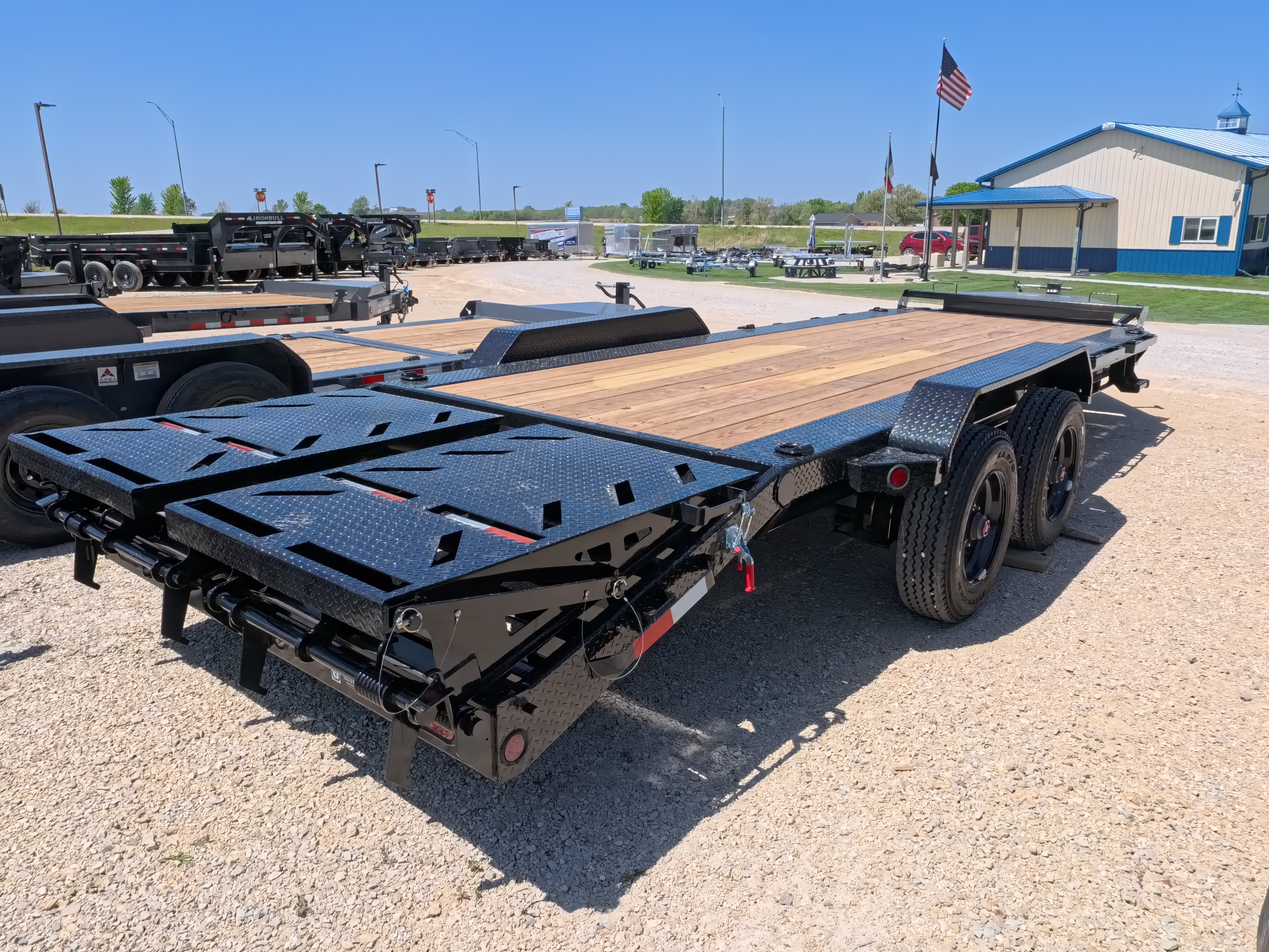 New 2026 Iron Bull 83 X 22 EHB Equipment Trailer w/2- 10K Axles, 4' Self Cleaning Dove Tail and 4' Rampage Ramps, Adj. 25K Coupler and 2 5/16" Receiver , LRJ 18 Ply Tires
