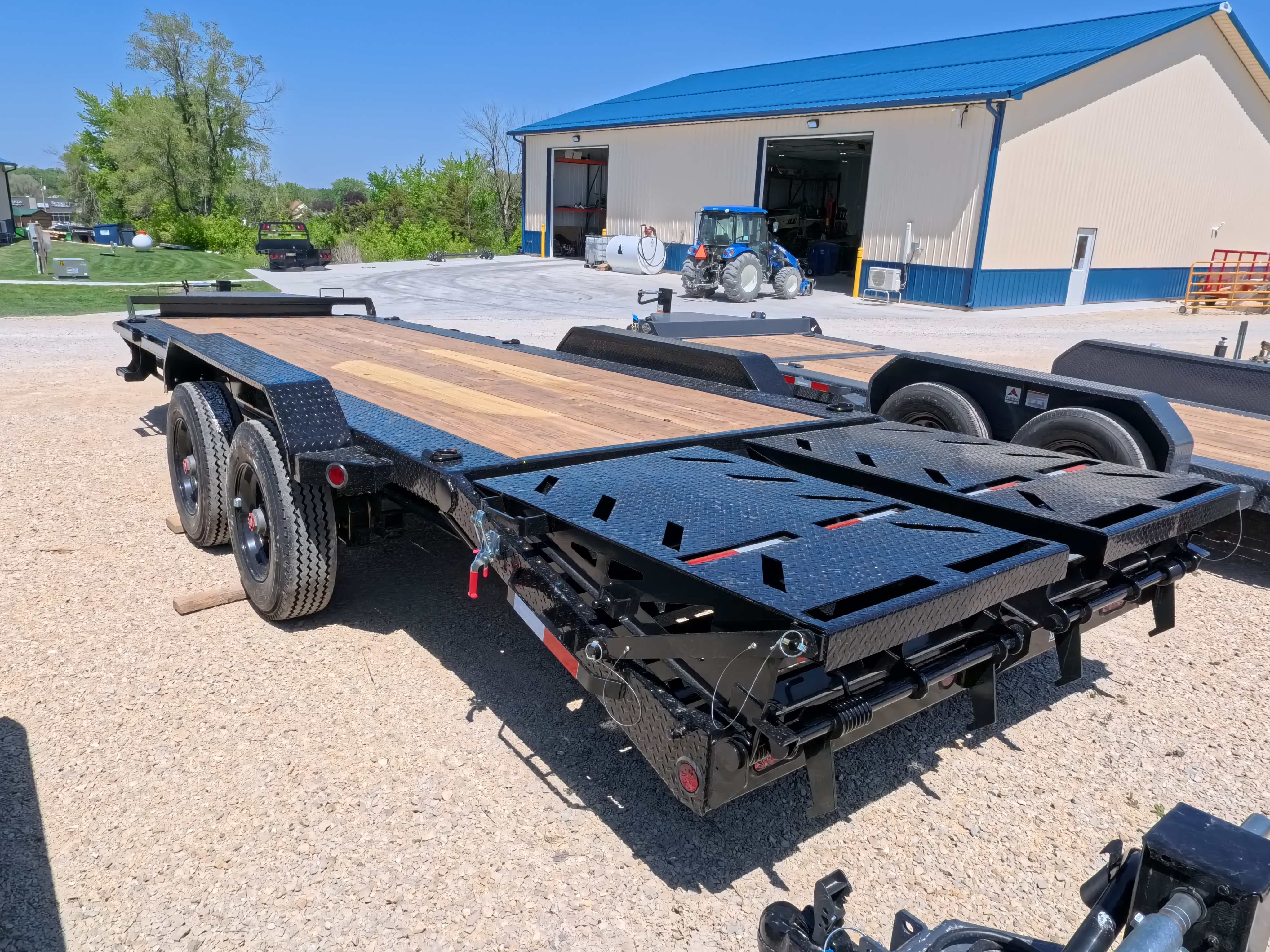 New 2026 Iron Bull 83 X 22 EHB Equipment Trailer w/2- 10K Axles, 4' Self Cleaning Dove Tail and 4' Rampage Ramps, Adj. 25K Coupler and 2 5/16" Receiver , LRJ 18 Ply Tires