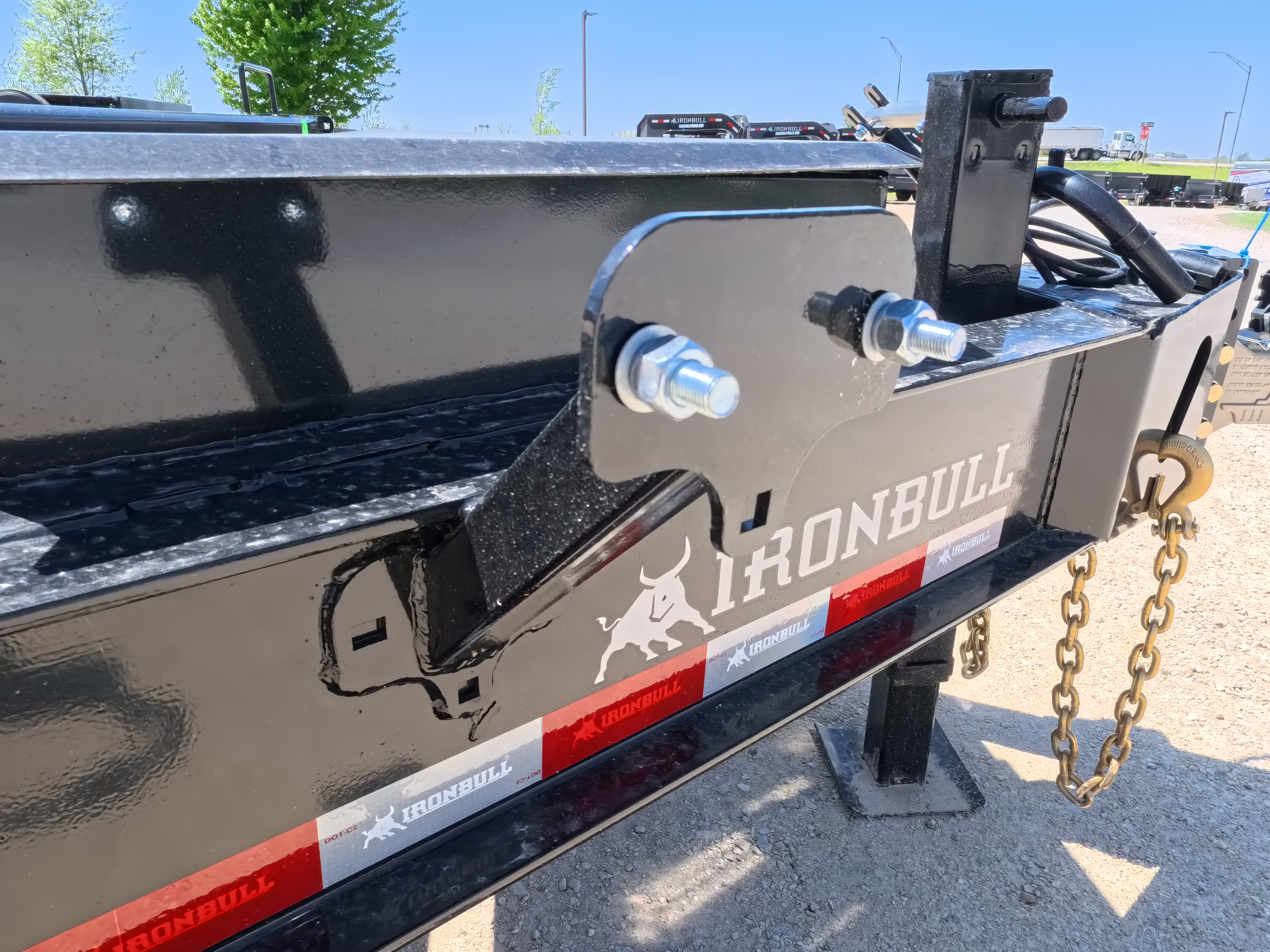 New 2026 Iron Bull 83 X 22 EHB Equipment Trailer w/2- 10K Axles, 4' Self Cleaning Dove Tail and 4' Rampage Ramps, Adj. 25K Coupler and 2 5/16" Receiver , LRJ 18 Ply Tires