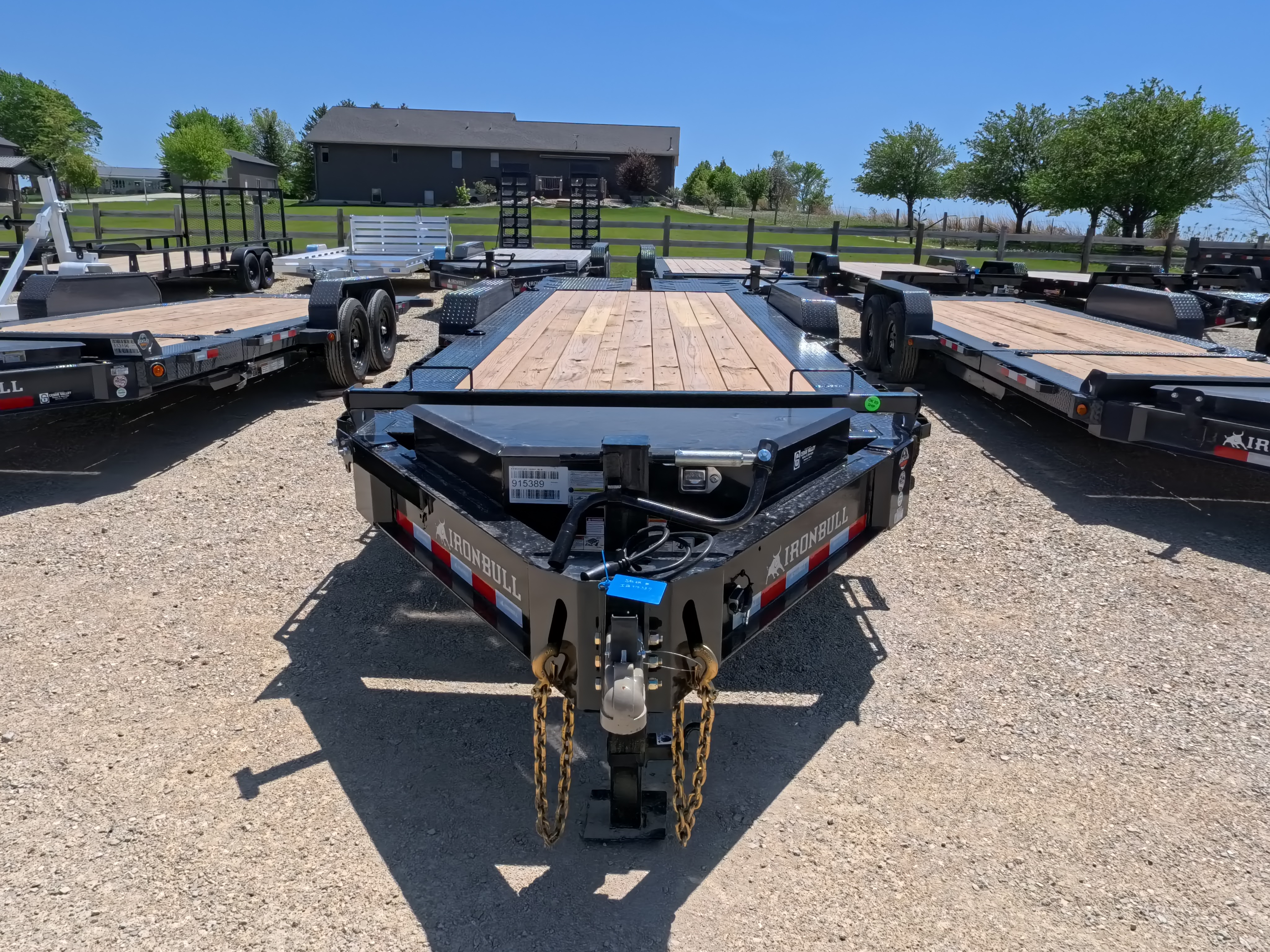 New 2026 Iron Bull 83 X 22 EHB Equipment Trailer w/2- 10K Axles, 4' Self Cleaning Dove Tail and 4' Rampage Ramps, Adj. 25K Coupler and 2 5/16" Receiver , LRJ 18 Ply Tires