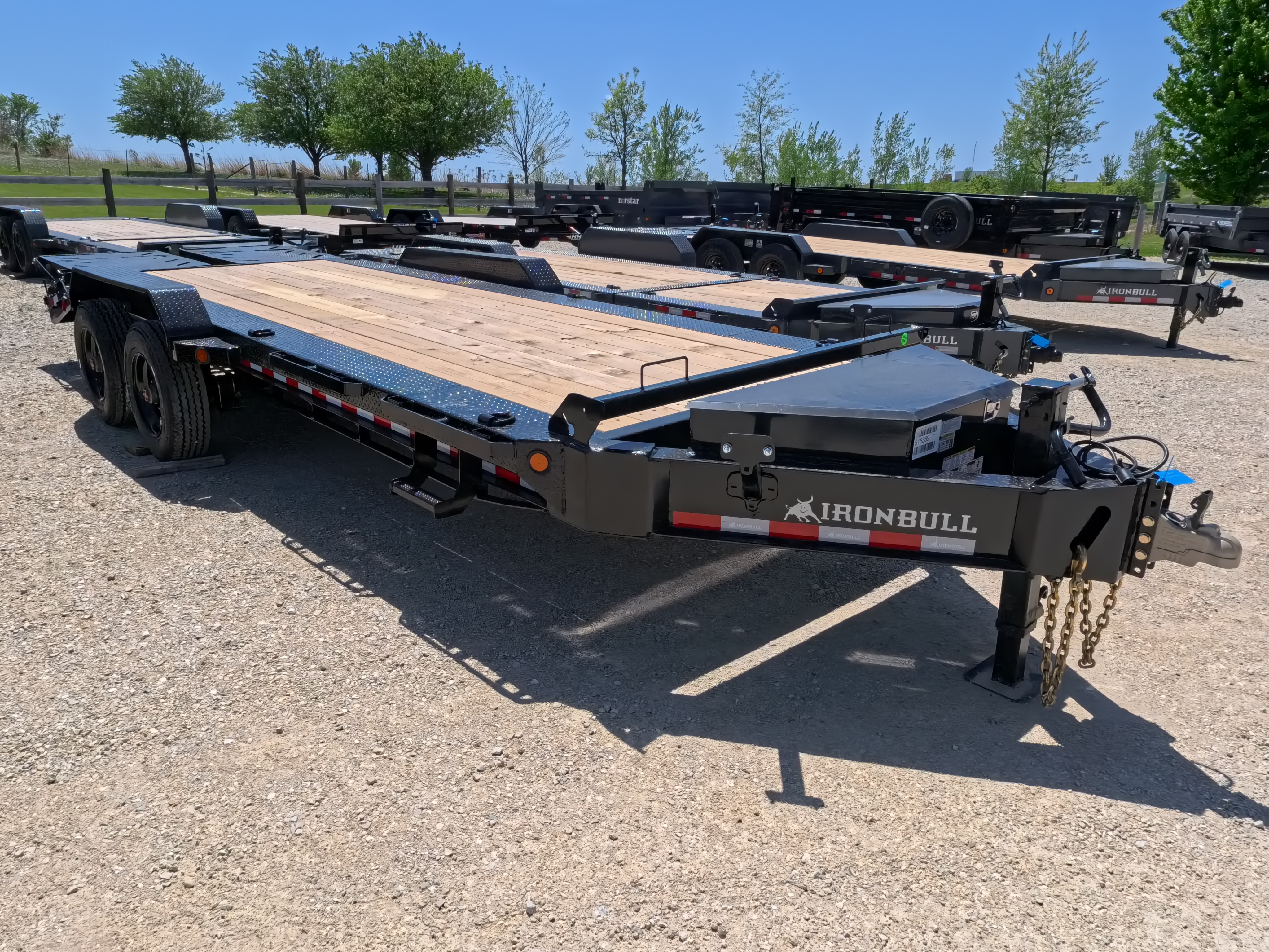 New 2026 Iron Bull 83 X 22 EHB Equipment Trailer w/2- 10K Axles, 4' Self Cleaning Dove Tail and 4' Rampage Ramps, Adj. 25K Coupler and 2 5/16" Receiver , LRJ 18 Ply Tires