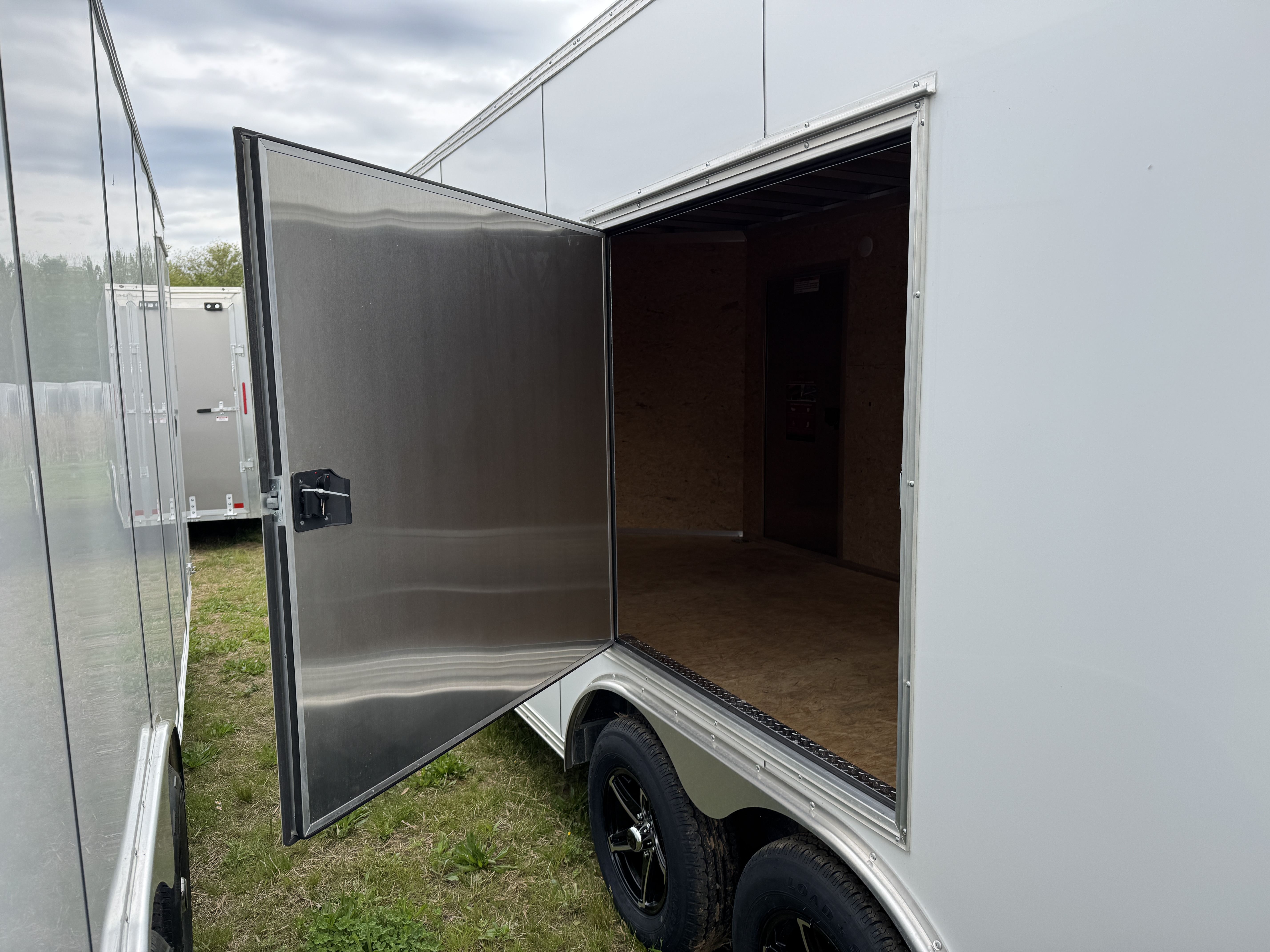 New 2026 E-Z Hauler EZEC8.5X20CH XLT PRO Car Hauler 7 FOOT 1 INCH INTERIOR HEIGHT 4 FOOT ESCAPE DOOR FREE ALUMINUM WHEEL UPGRADE .080 POLY CORE