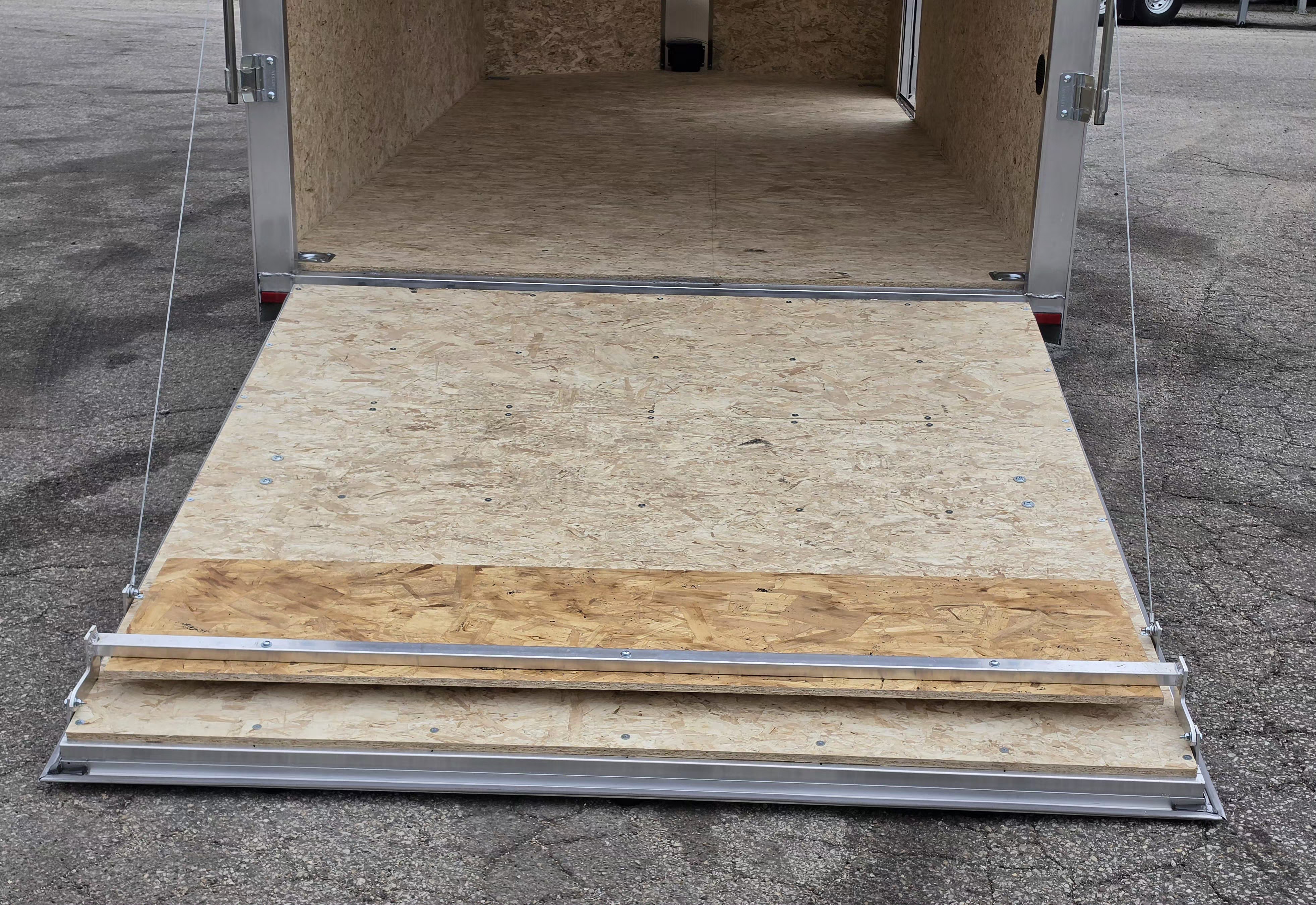 New 7 X 16 CARGO ENCLOSED TANDEM AXLE ALL ALUMINUM LIGHTNING 2026 REAR RAMP DOOR