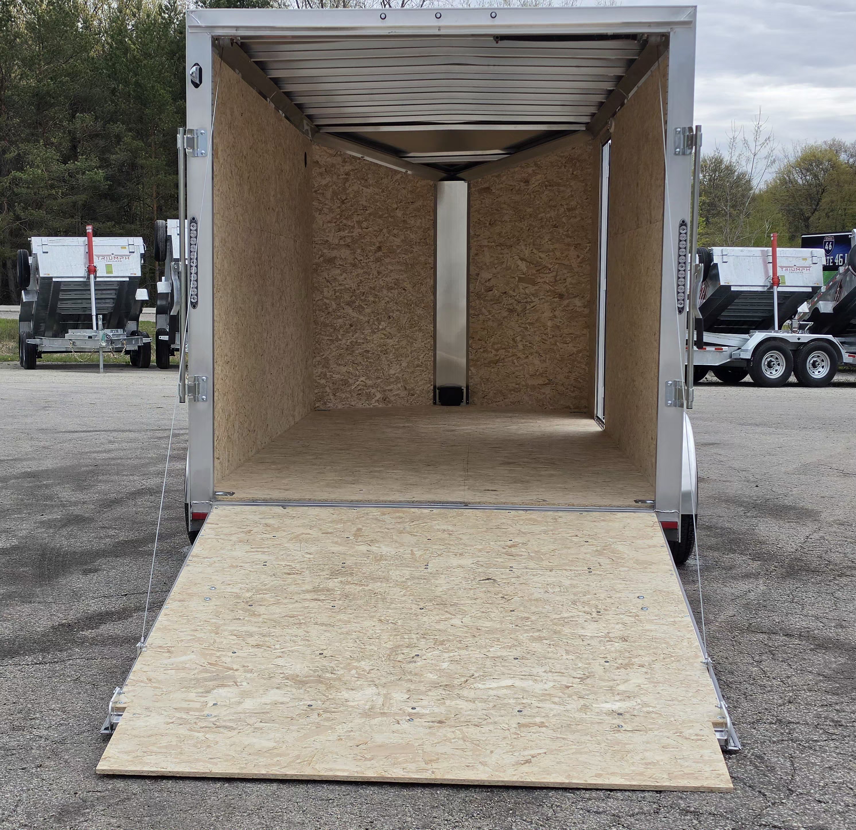 New 7 X 16 CARGO ENCLOSED TANDEM AXLE ALL ALUMINUM LIGHTNING 2026 REAR RAMP DOOR