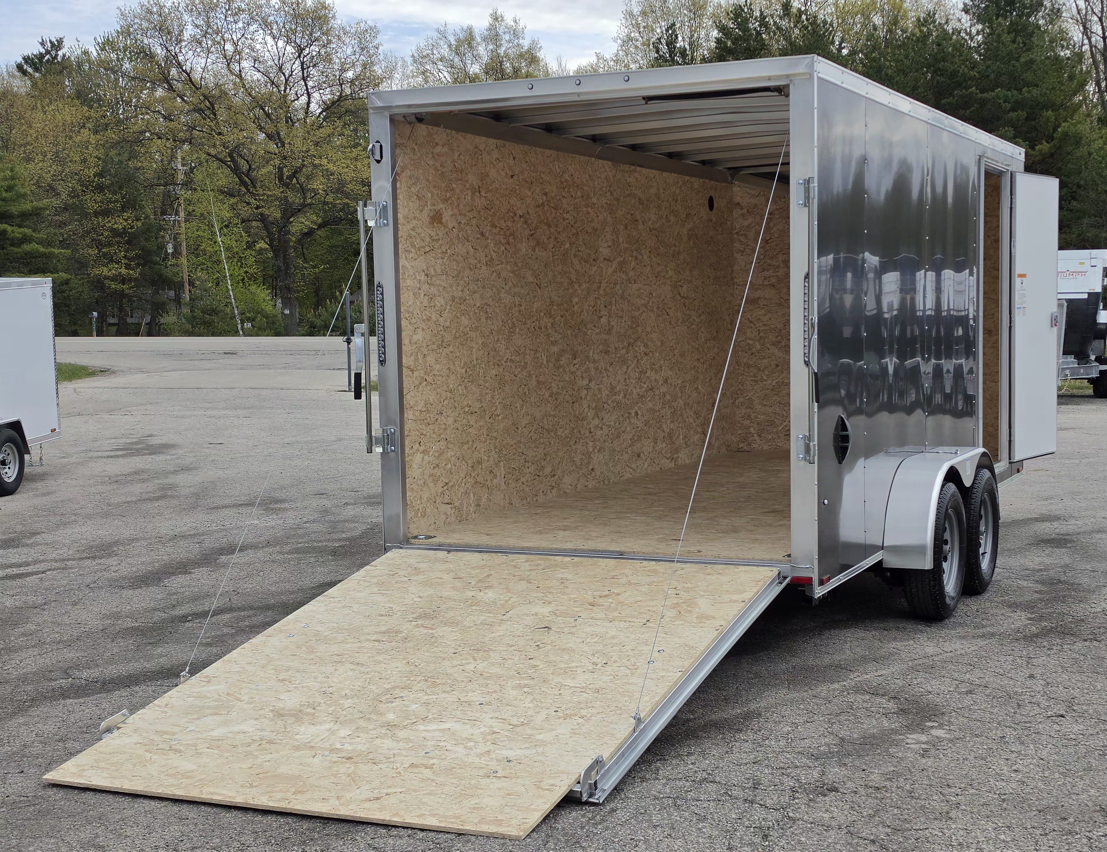 New 7 X 16 CARGO ENCLOSED TANDEM AXLE ALL ALUMINUM LIGHTNING 2026 REAR RAMP DOOR