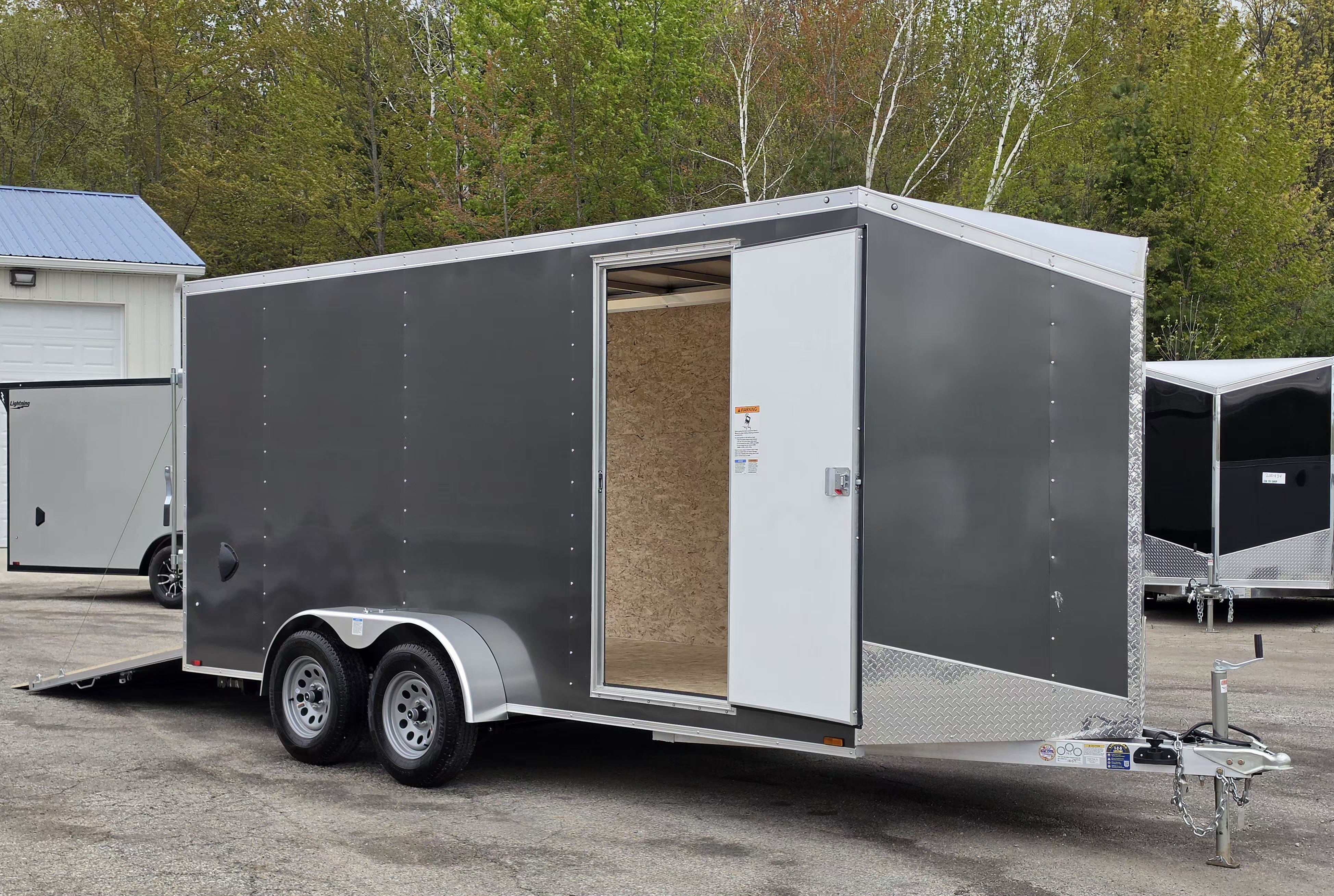 New 7 X 16 CARGO ENCLOSED TANDEM AXLE ALL ALUMINUM LIGHTNING 2026 REAR RAMP DOOR