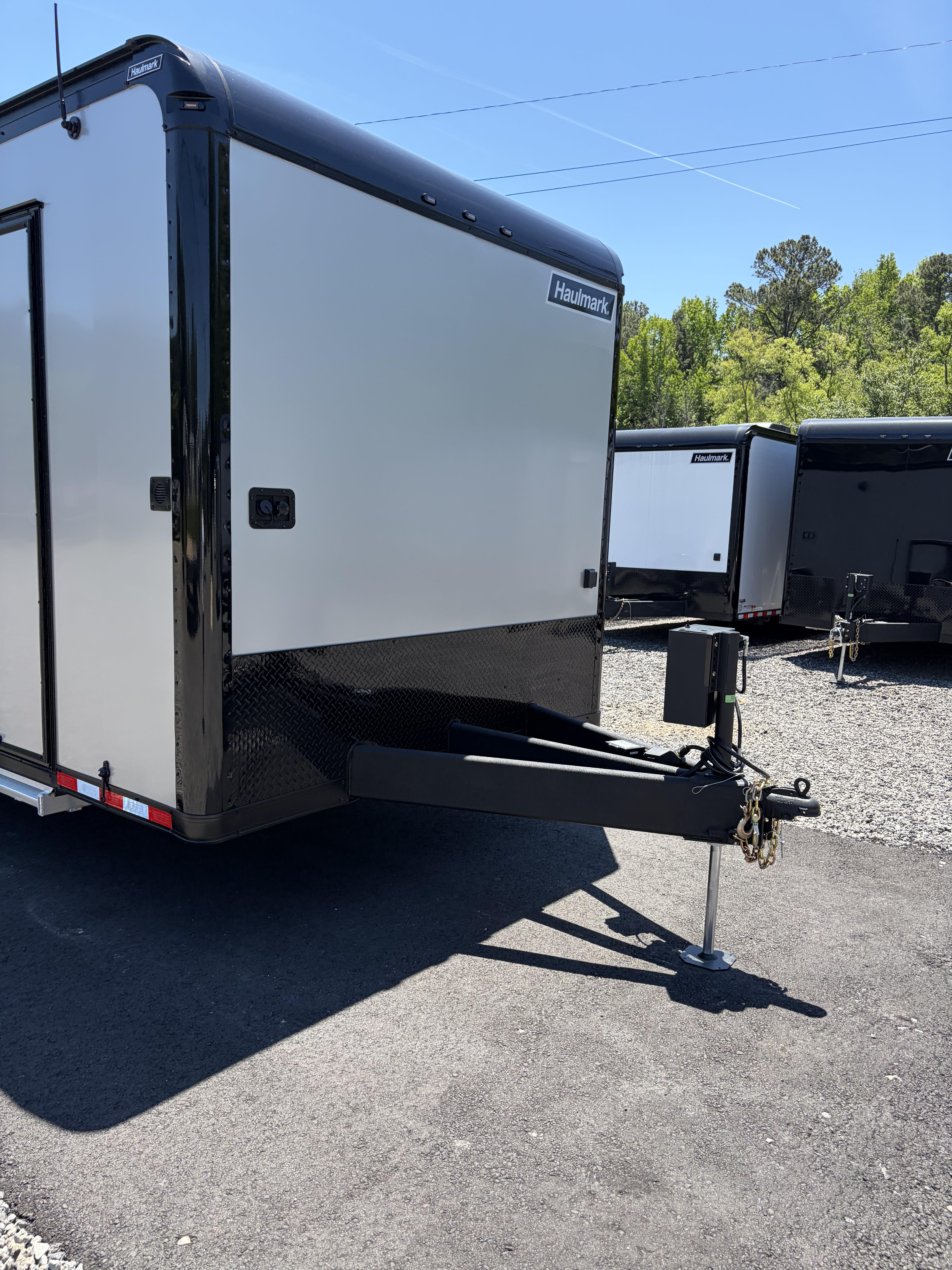 New 2026 Haulmark 34 Bathroom Race Trailer, Air Prep PKG, Awning, Polycor, Insulated, Window, 54" ALX Slide Out Step, A/C + Heat